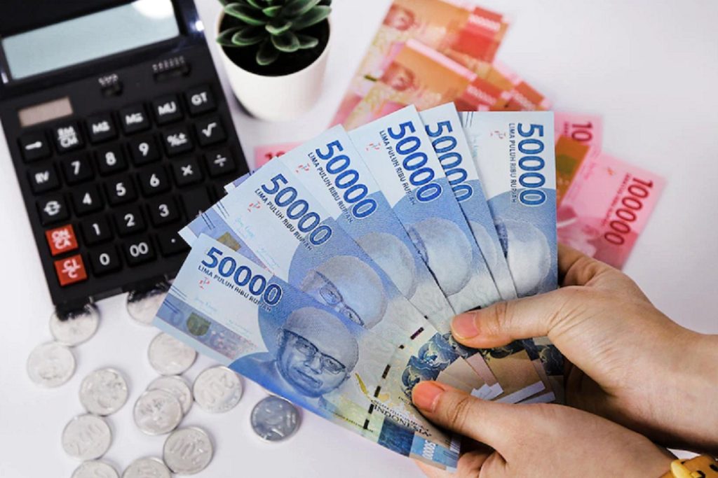RI Masih Jauh dari Krisis Meski Rupiah Sempat Tembus Rp18.000 per USD : Okezone Economy